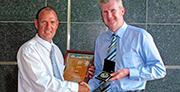 Tony Burke MP, Minister for Agriculture, Fisheries and Forestry presents Bill Crabtree with the 24th McKell Medal